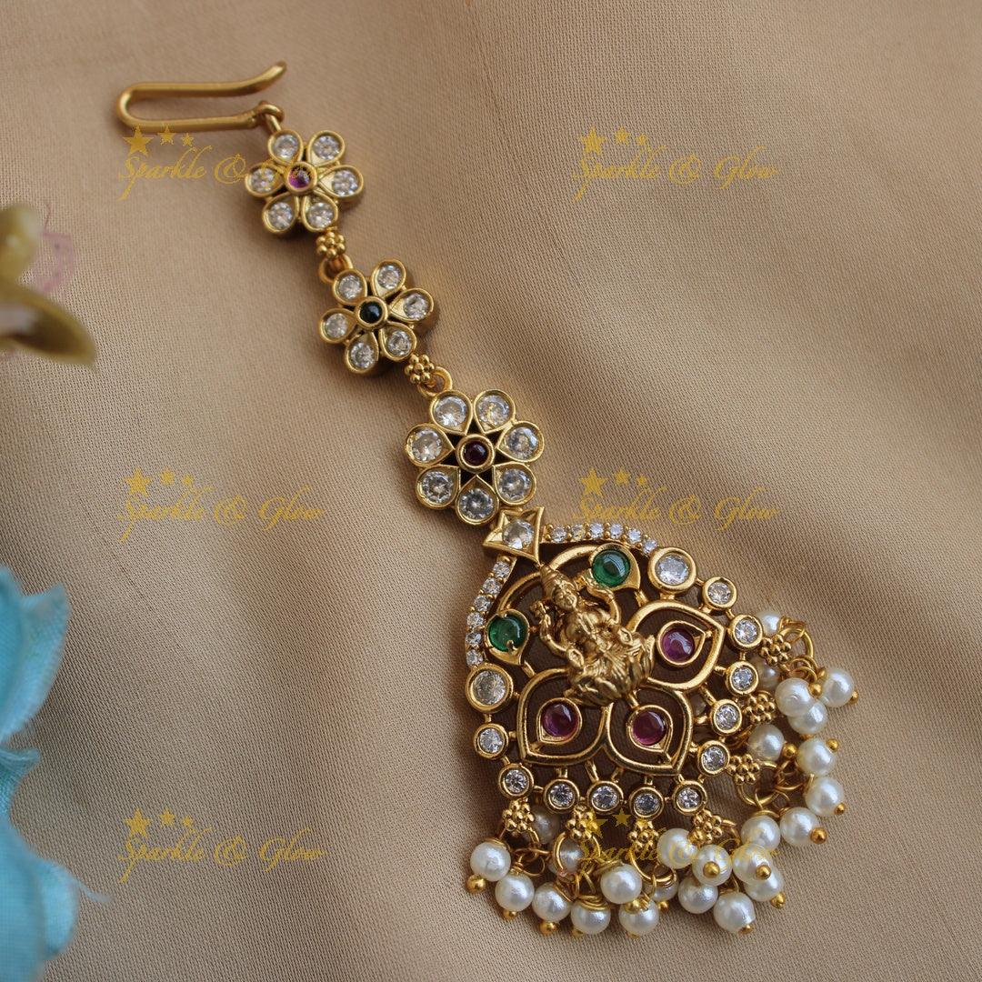 Lakshmi floral design maang tikka with stones ruby emerald and pearls - Sparkle and Glow