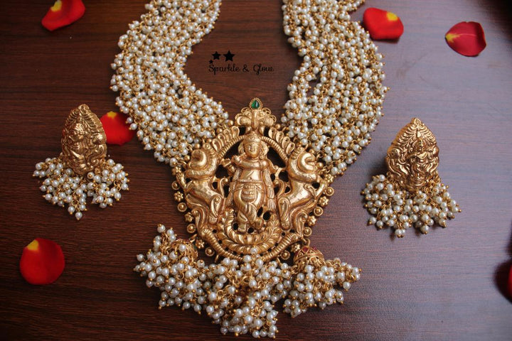 Gold alike polished pearl necklace with krishna playing flute pendent - Sparkle and Glow