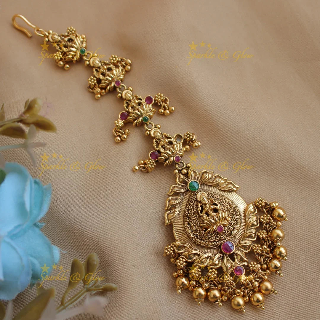 Lakshmi leaf design matt finish maang tikka with ruby emerald and gold beads - Sparkle and Glow