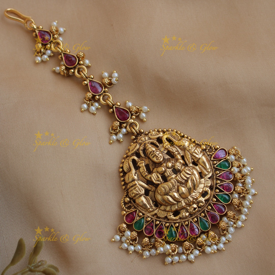 Beautiful Lakshmi elephant carved gutta pusalu maang tikka with ruby emerald and pearls