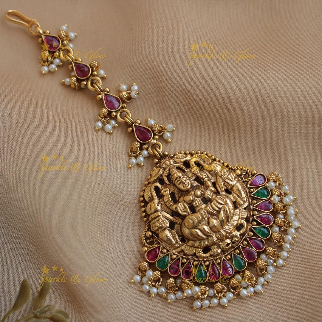 Beautiful Lakshmi elephant carved gutta pusalu maang tikka with ruby emerald and pearls - Sparkle and Glow