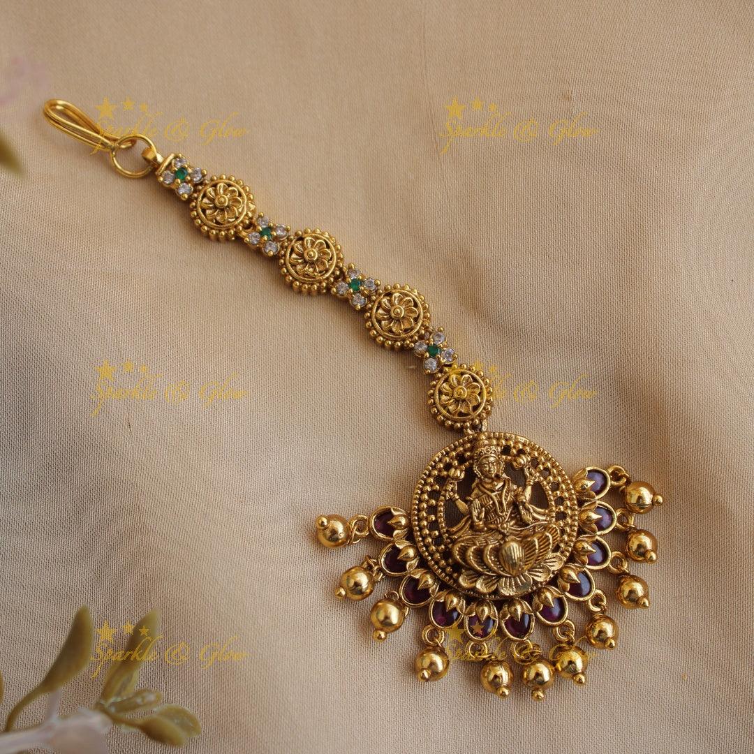 Gold alike Lakshmi flower carved maang tikka with stones ruby and gold beads - Sparkle and Glow
