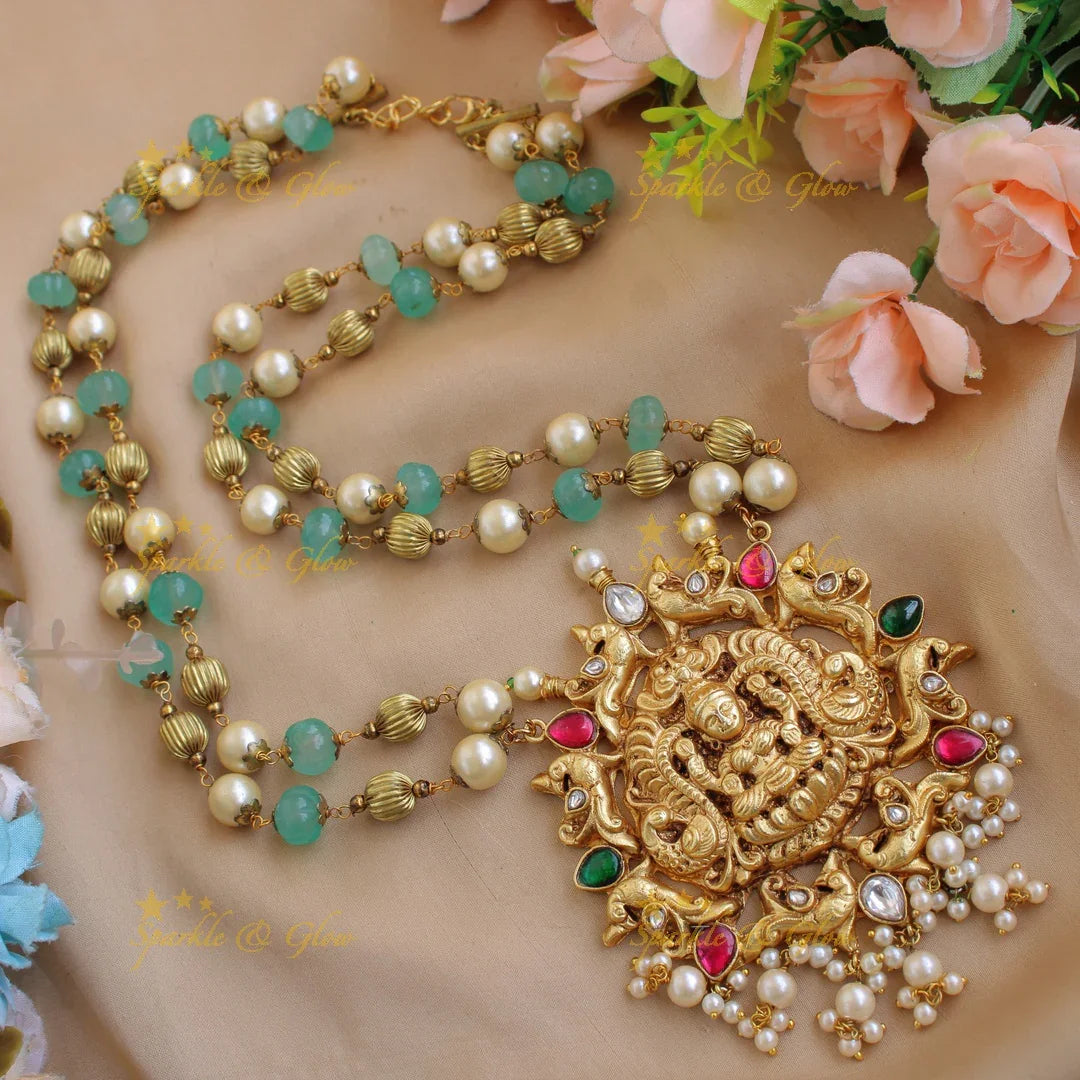 Exclusive Lakshmi peacock carved jadau pendent with two layer pearl gold and green beads chain - Sparkle and Glow