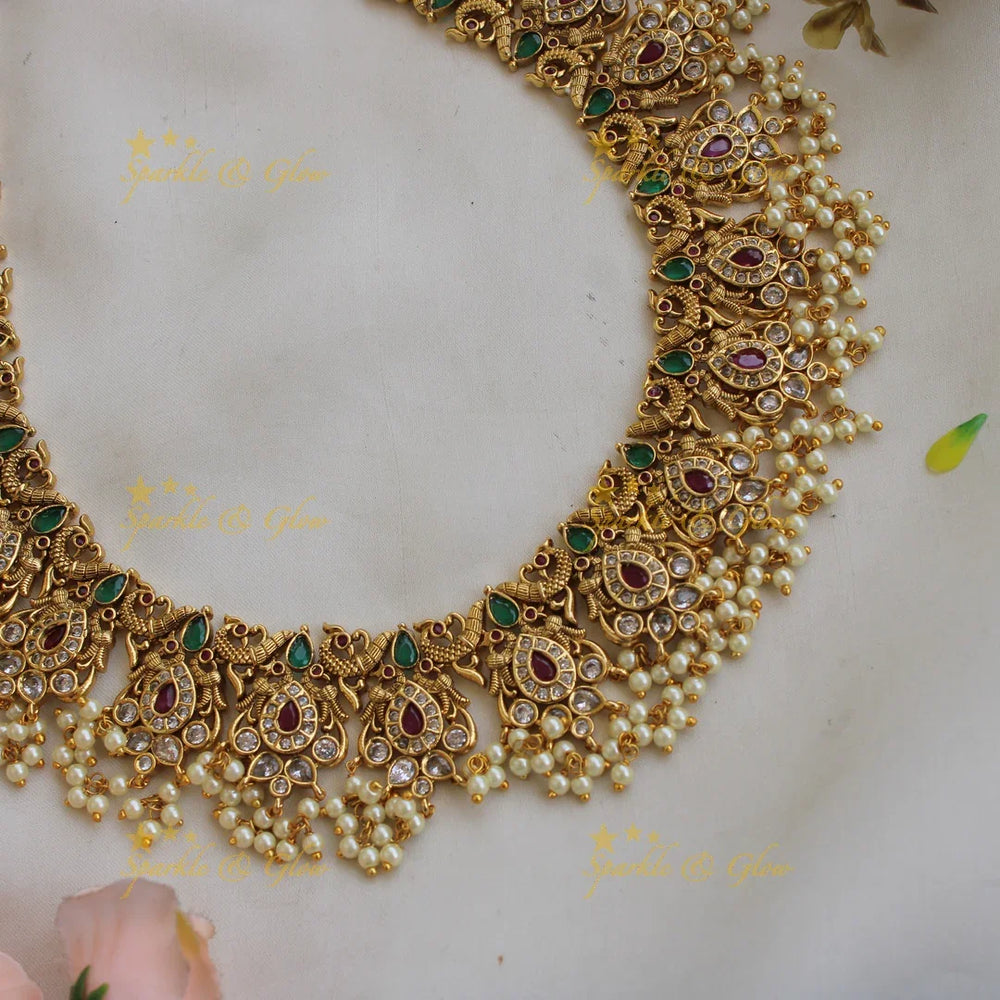 Grand intricate Peacock gutta pusalu Long necklace with ruby and emerald - Sparkle and Glow