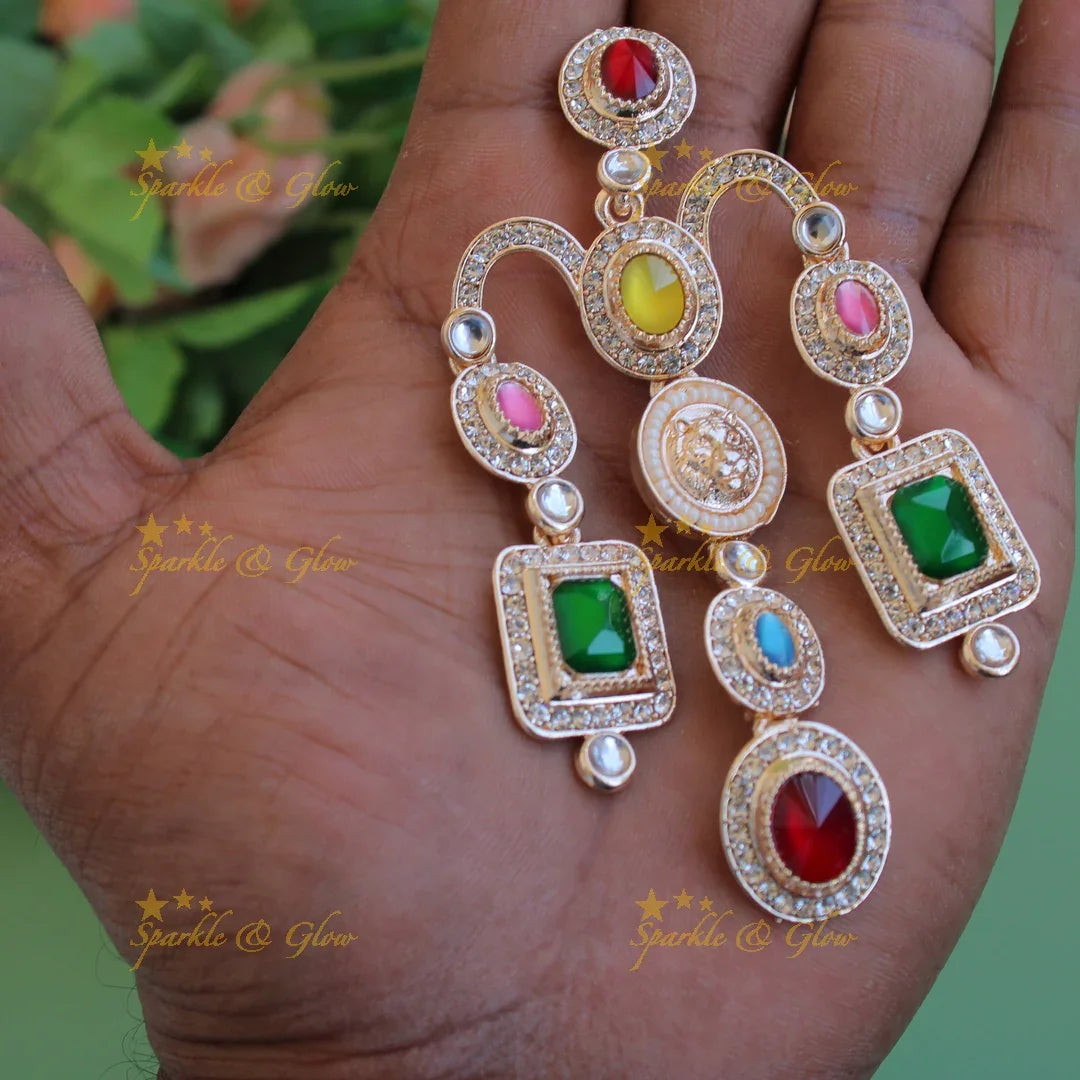 Bollywood inspired Sabyasachi Beautiful three layer lion face carved victorian gold finish earrings with stones - Sparkle and Glow