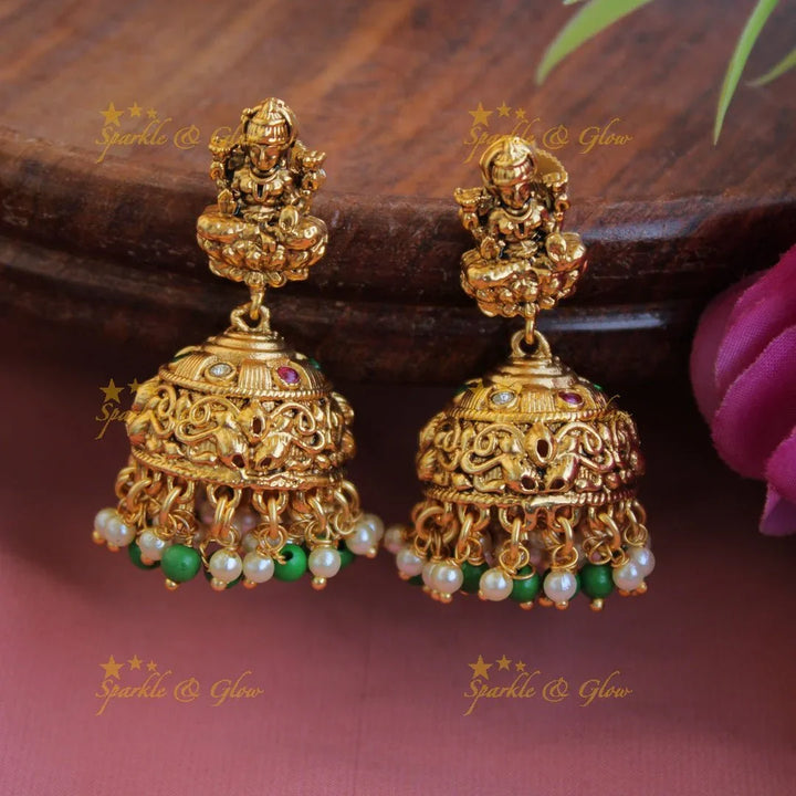 Grand gold alike Lakshmi peacock carved gutta pusalu long necklace with ruby emerald and green beads - Sparkle and Glow