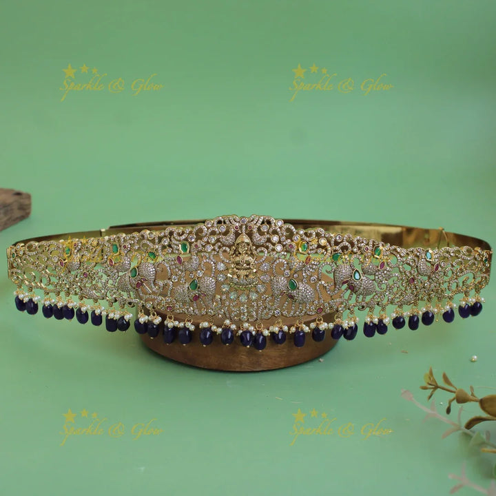 Gorgeous Lakshmi peacock elephant carved gold finish victorian ad hipbelt with ruby emerald and Mint green beads - Sparkle and Glow