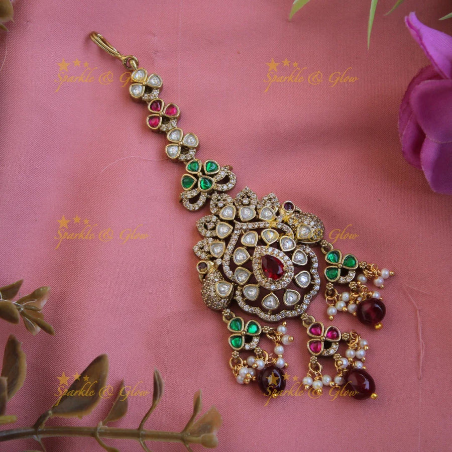 Exclusive Peacock victorian maang tikka with maroon beads - Sparkle and Glow