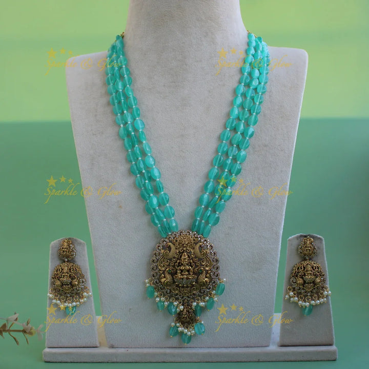 Beautiful Lakshmi peacock carved pendant Victorian AD haram with multi layer sea blue beads chain - Sparkle and Glow