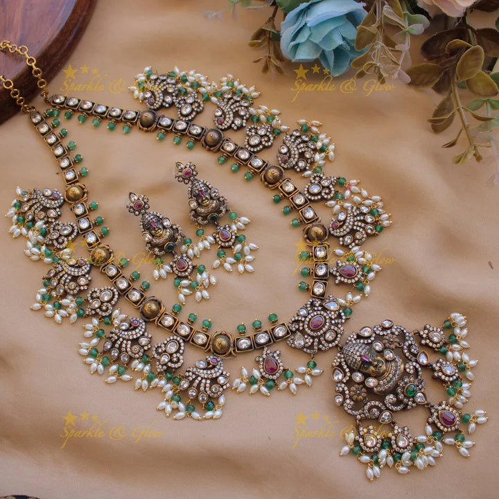 Exclusive Balaji carved Victorian AD gutta pusalu haram with floral peacock drops rice pearls and mint green beads - Sparkle and Glow