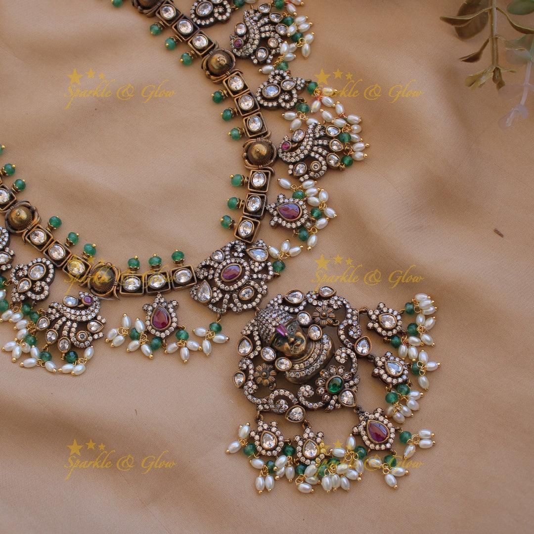 Exclusive Balaji carved Victorian AD gutta pusalu haram with floral peacock drops rice pearls and mint green beads - Sparkle and Glow