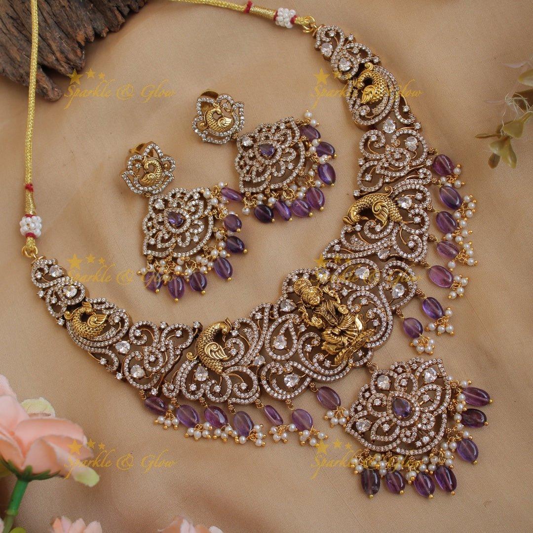 Exclusive Lakshmi peacock carved floral dual tone victorian AD short necklace with purple beads - Sparkle and Glow