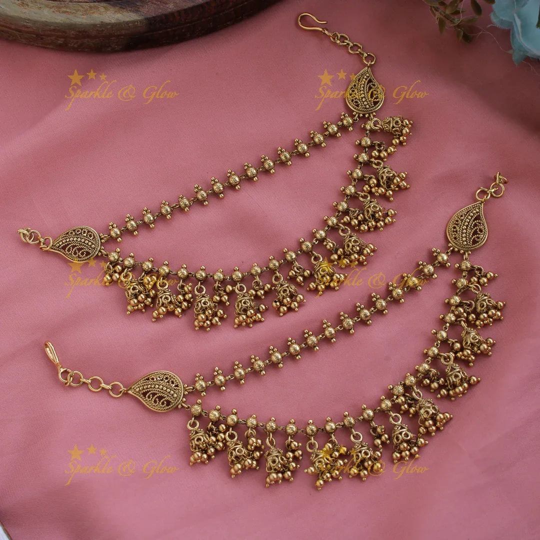 Gold alike layer Jhumka dropping earchain with gold beads - Sparkle and Glow