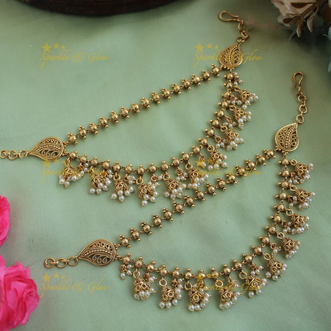 Gold alike layer Jhumka dropping earchain with gold beads - Sparkle and Glow