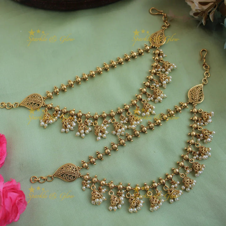 Gold alike layer Jhumka dropping earchain with gold beads - Sparkle and Glow