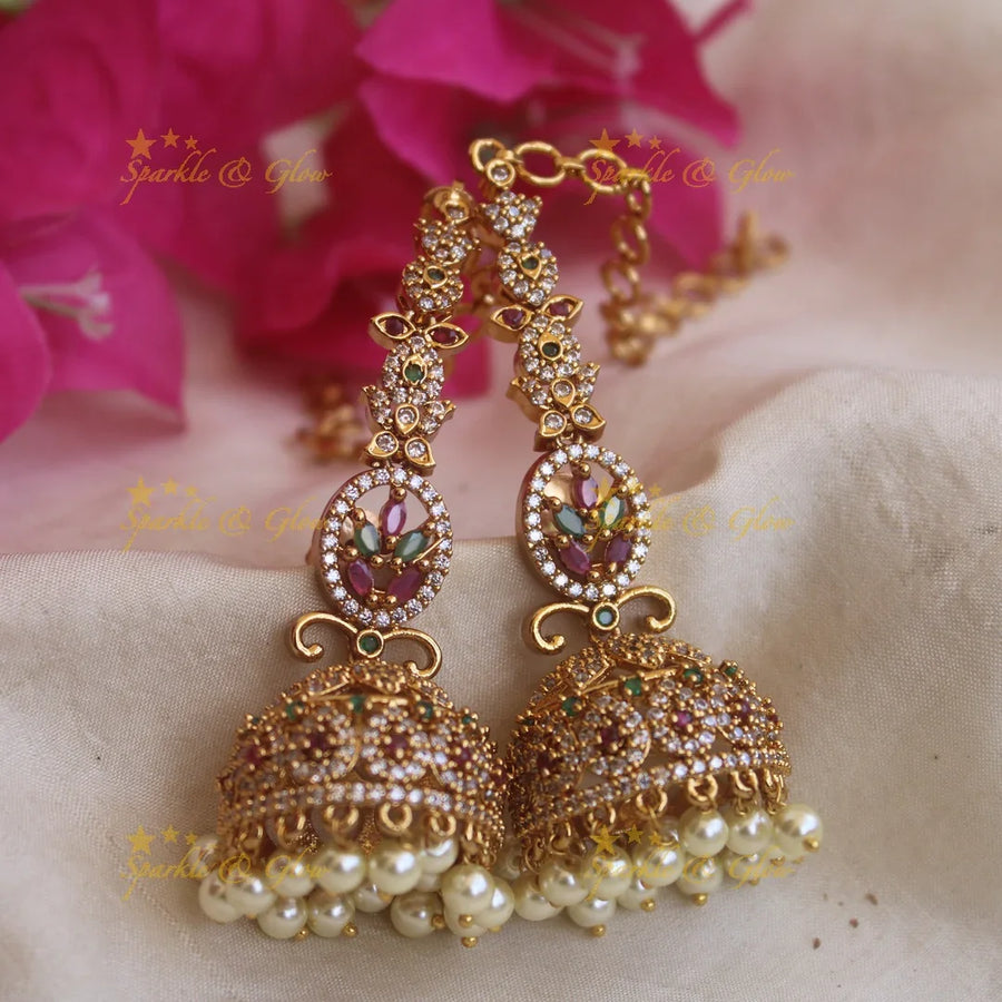 Beautiful Floral design AD stone Jhumkas with Earchain - Sparkle and Glow