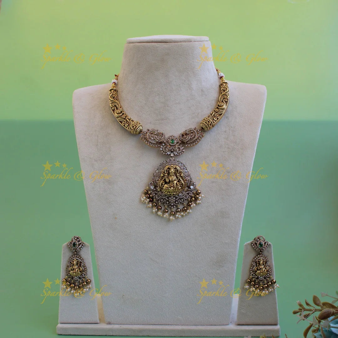 Gorgeous Lakshmi peacock floral design dual tone victorian AD short necklace with pearls and green beads - Sparkle and Glow