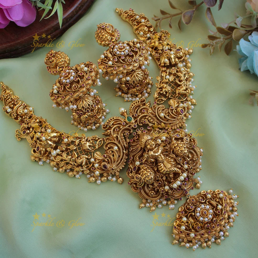 Grand intricate Krishna playing flute and peacock carved short necklace with pearls and gold beads - Sparkle and Glow