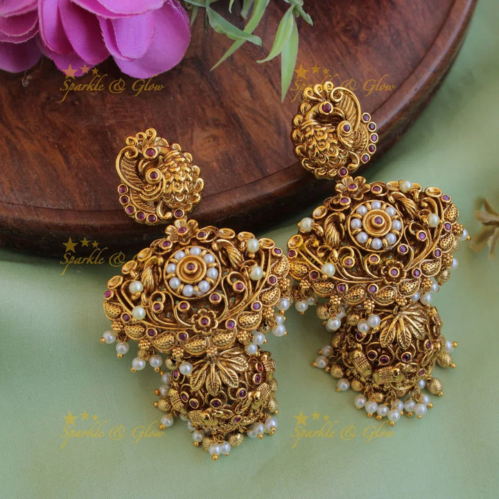 Grand intricate Krishna playing flute and peacock carved short necklace with pearls and gold beads - Sparkle and Glow