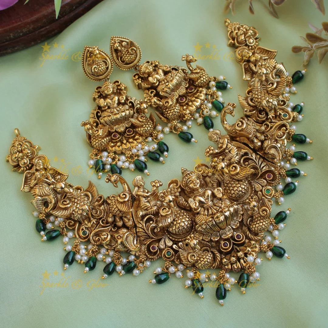 Exquisite gold alike Lakshmi peacock carved short necklace with pearls and green beads - Sparkle and Glow