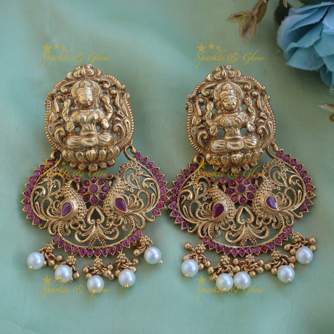 Gold alike Lakshmi peacock earrings with ruby and pearls