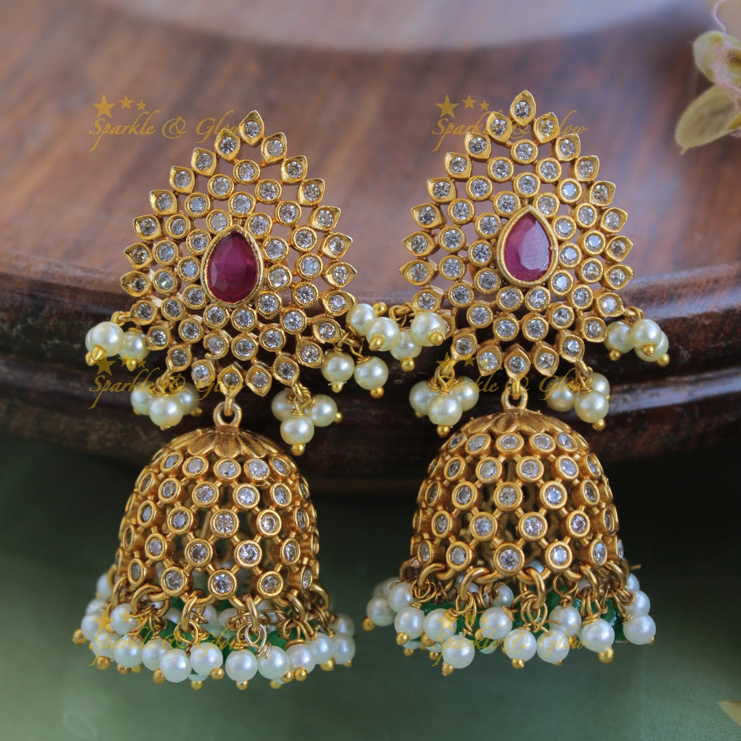 Beautiful CZ white stone jhumukas with ruby and pearls