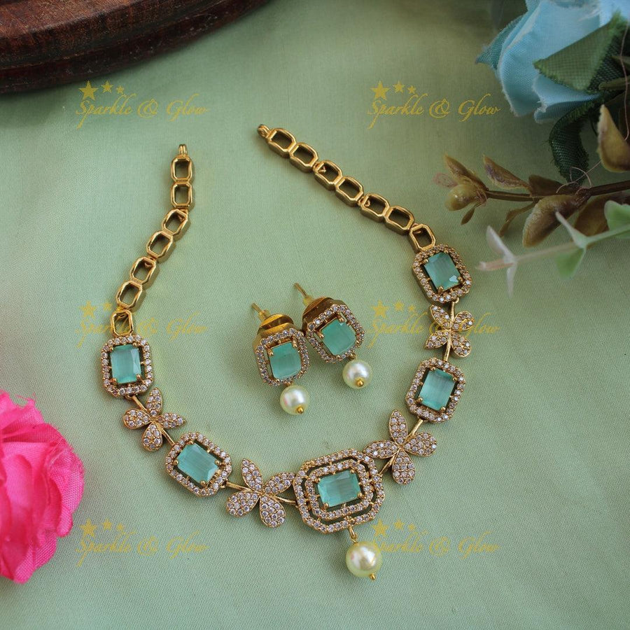 Statement butterfly design AD short necklace with mint green stones and pearl drop - Sparkle and Glow
