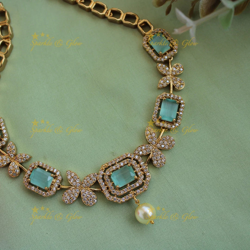 Statement butterfly design AD short necklace with mint green stones and pearl drop - Sparkle and Glow