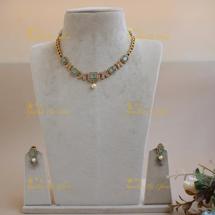 Statement butterfly design AD short necklace with mint green stones and pearl drop - Sparkle and Glow