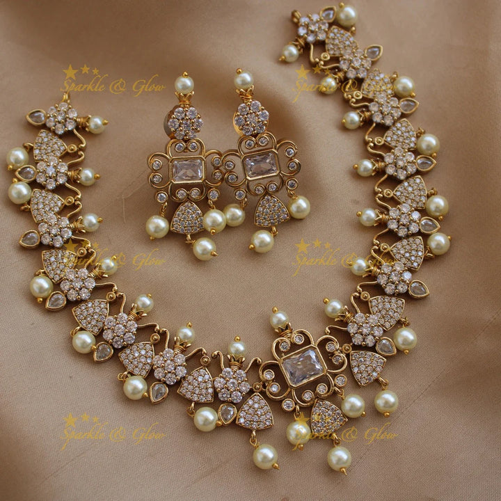 Beautiful floral and triangle design AD short necklace with ruby stones - pink - Sparkle and Glow