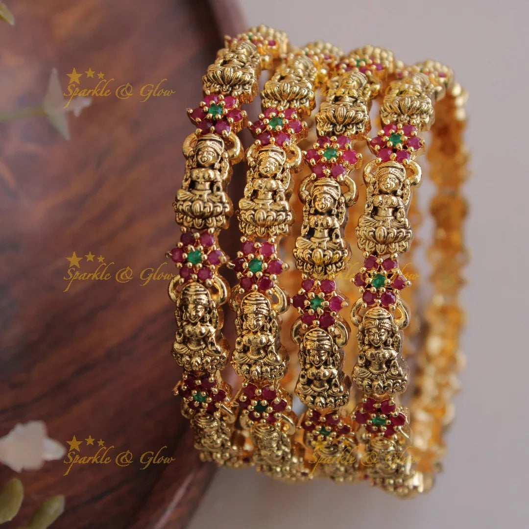 Elegant Lakshmi carved floral bangles with multi ruby emerald stones two pairs, - Sparkle and Glow
