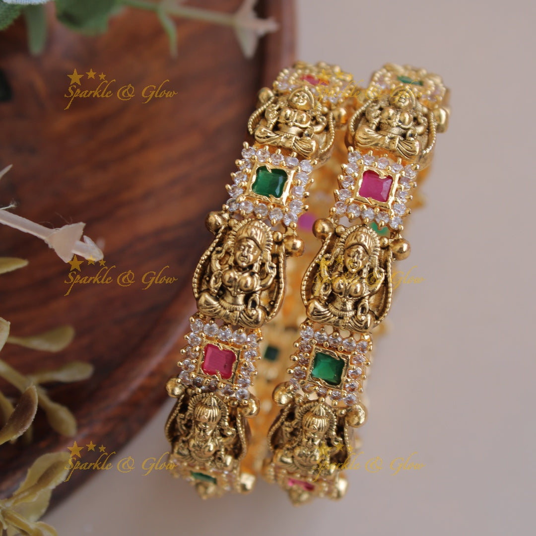 Beautiful Lakshmi carved bangles with ruby emerald and white stones a pair, 2.4