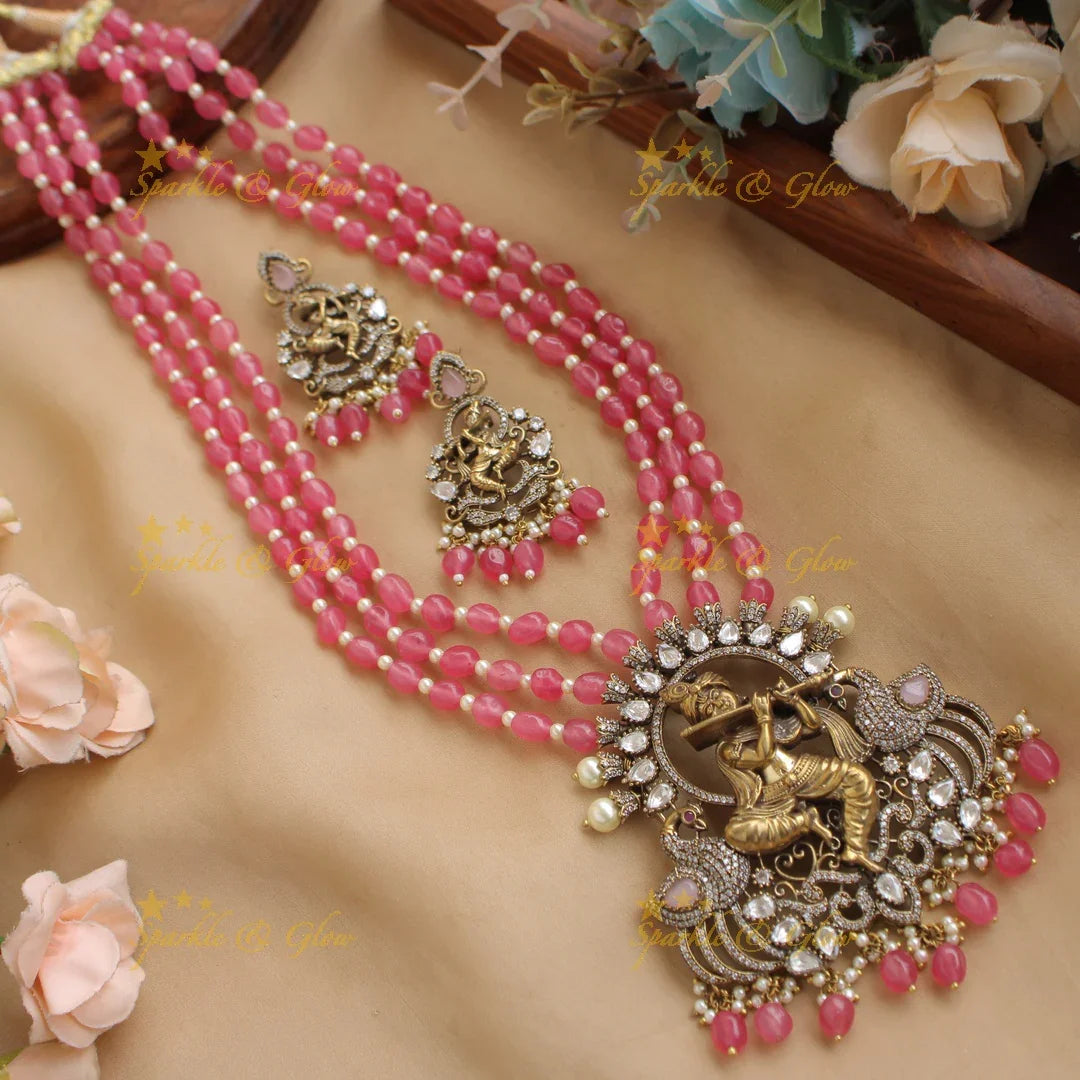 Statement Krishna playing flute peacock design pendant Victorian AD haram with multi layer beads chain - blue - Sparkle and Glow