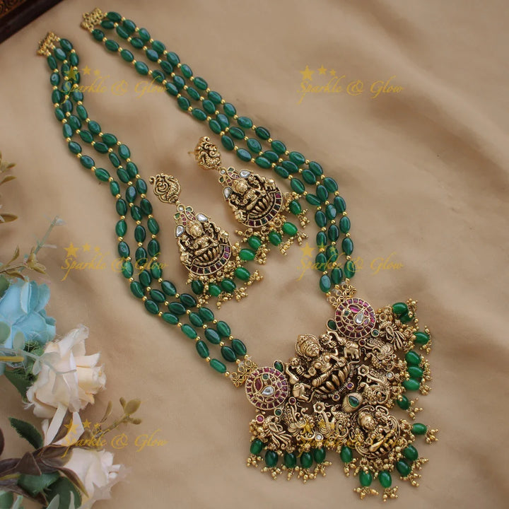 Beautiful Lakshmi peacock carved pendant long necklace with multi layer green beads chain - Sparkle and Glow