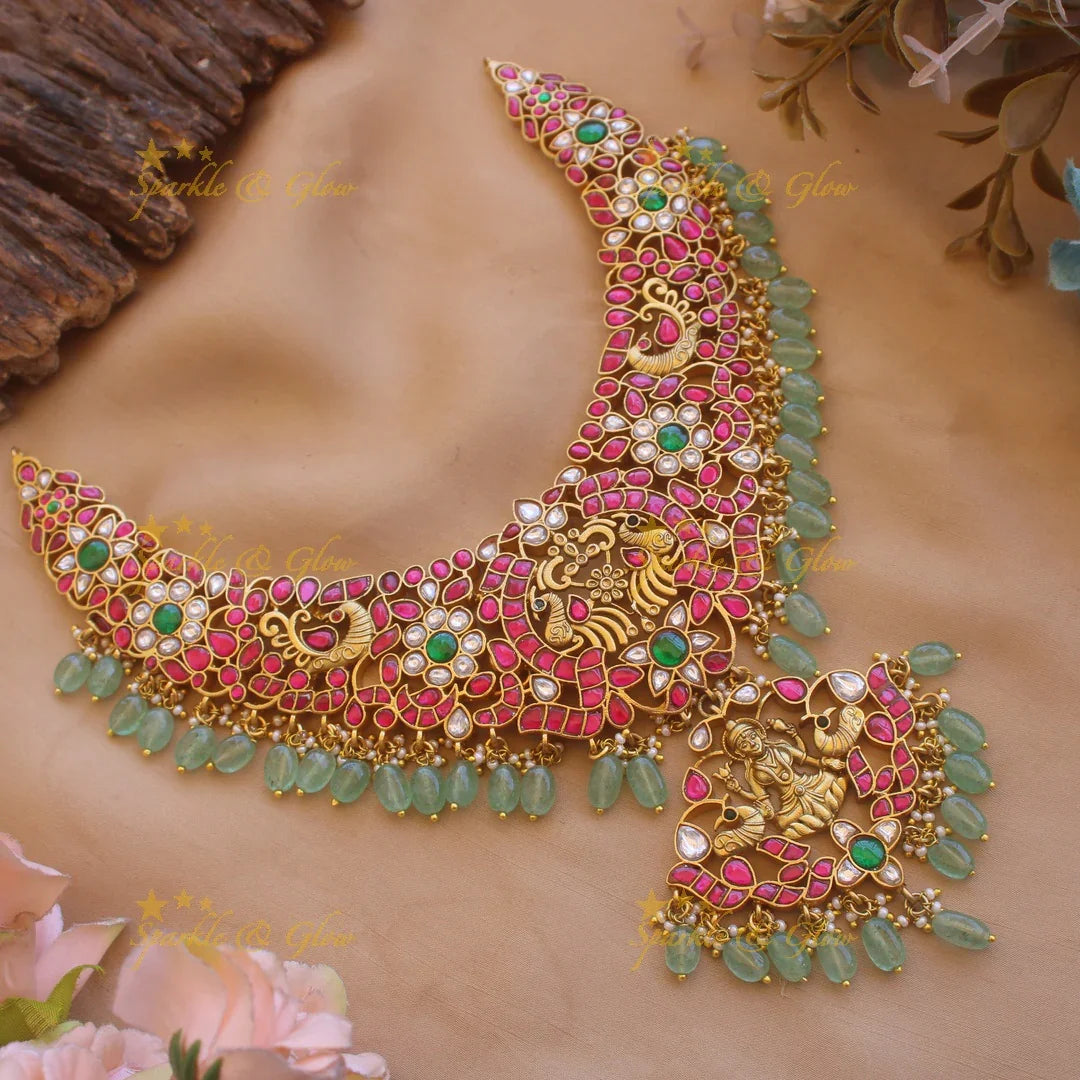 Grand intricate Lakshmi peacock carved floral jadau short necklace with pearls and mint green beads - Sparkle and Glow