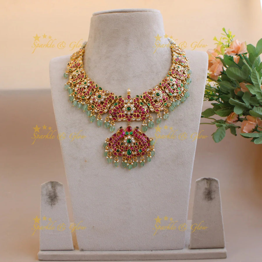 Statement Peacock floral design jadau short necklace with pearls and mint green beads - Sparkle and Glow