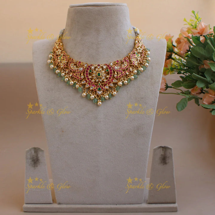Stunning Peacock flower carved jadau short necklace with pearls and mint green beads - Sparkle and Glow