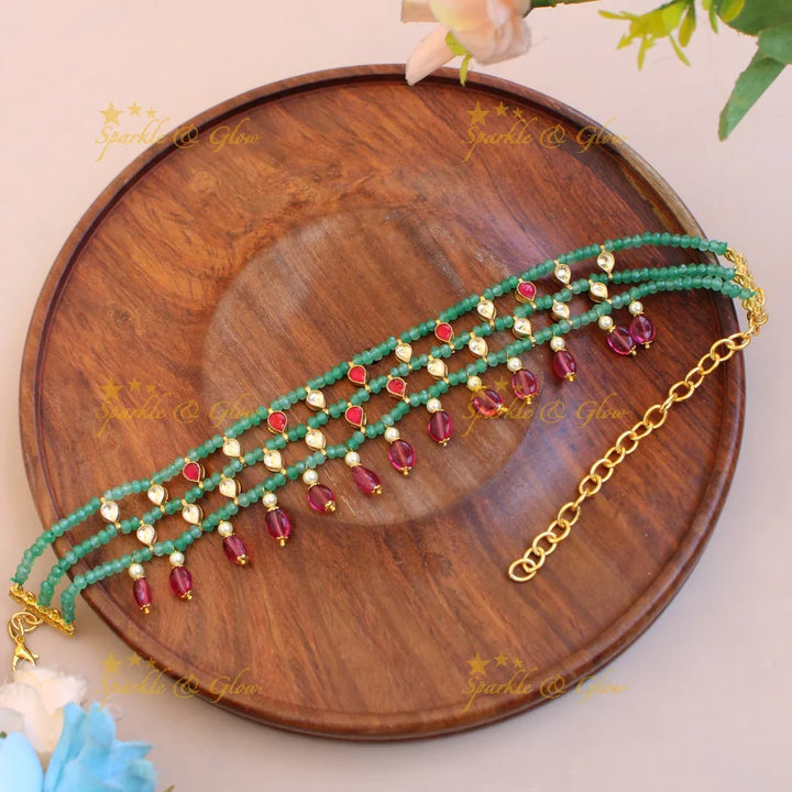Elegant layer green beads and kundan choker with pink bead drops - Sparkle and Glow