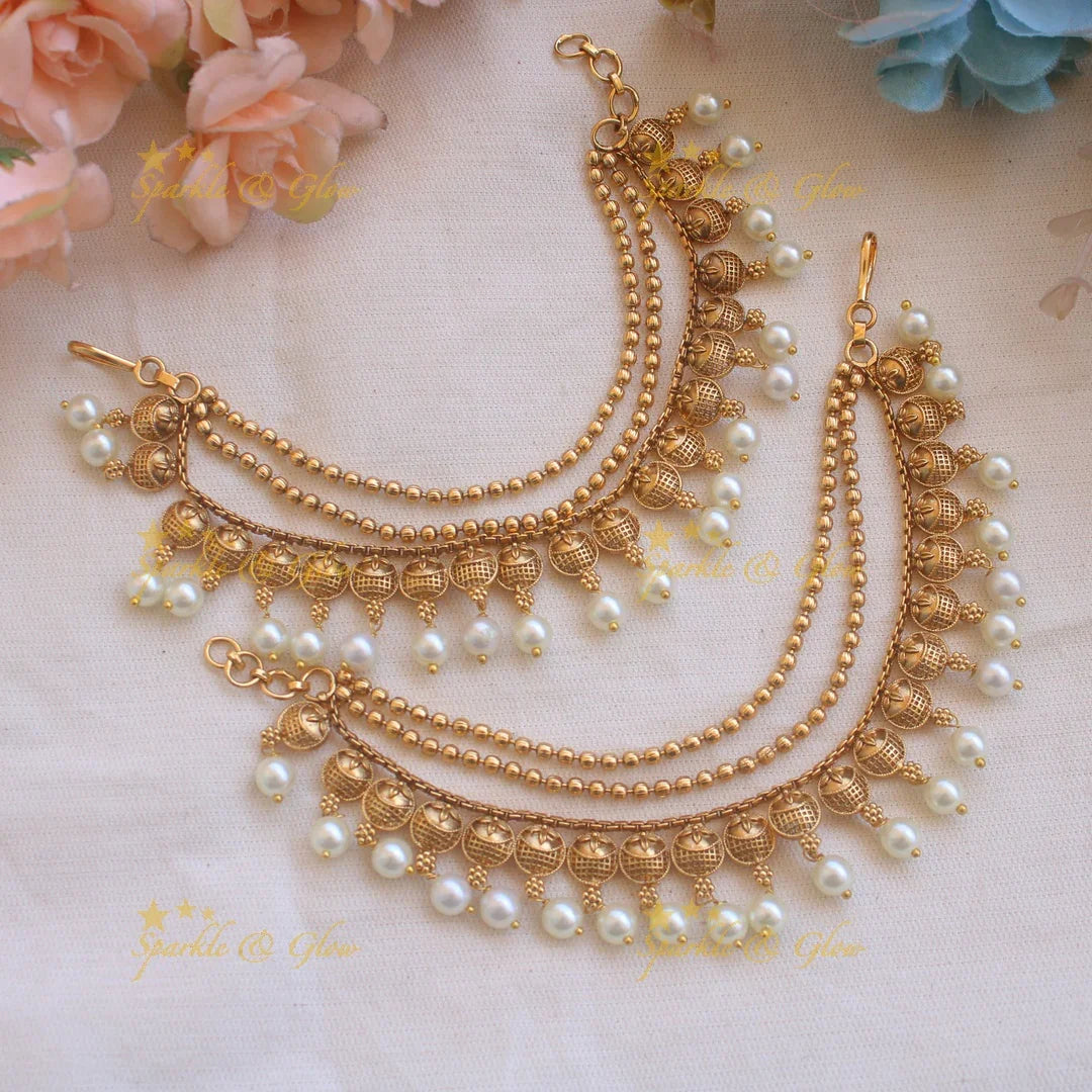 Stunning gold polished earchain with pearls - Sparkle and Glow