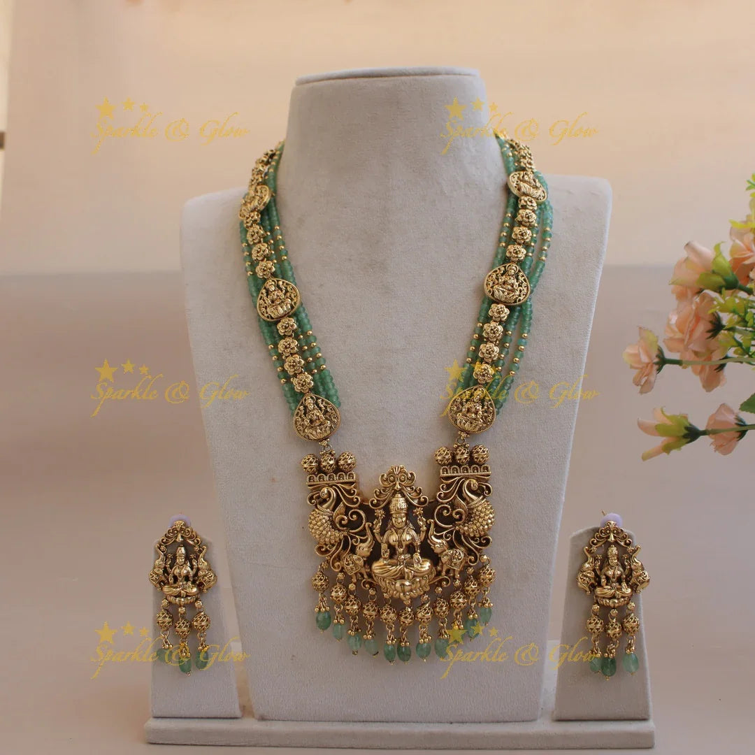 Gorgeous Lakshmi peacock elephant carved pendant multi layer beads haram with gold beads - mint green - Sparkle and Glow