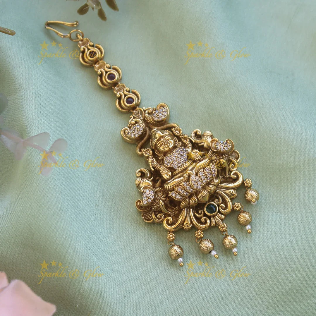Beautiful Gold alike Lakshmi peacock with AD Stone maang tikka with Gold beads - Sparkle and Glow