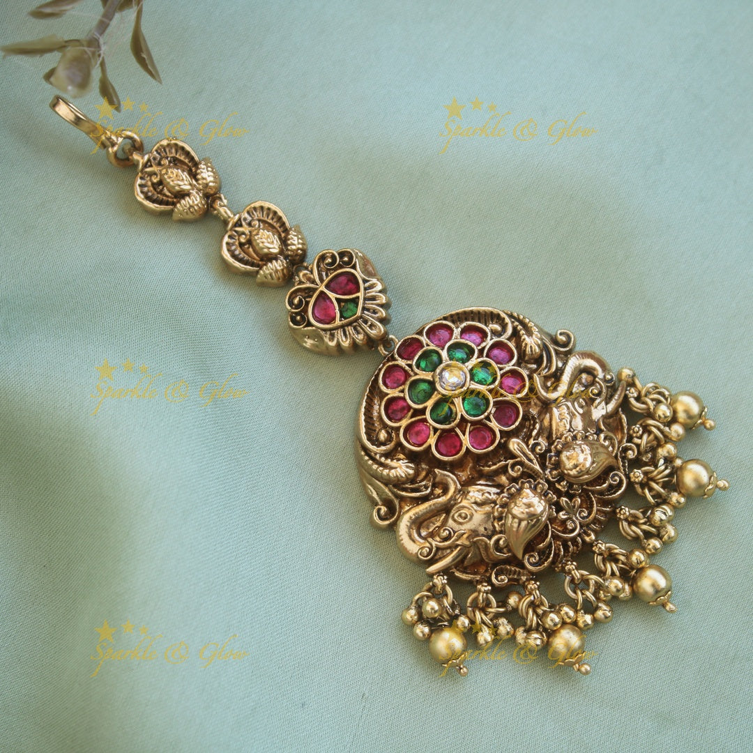 Exclusive gold alike floral design elephant maang tikka with gold beads
