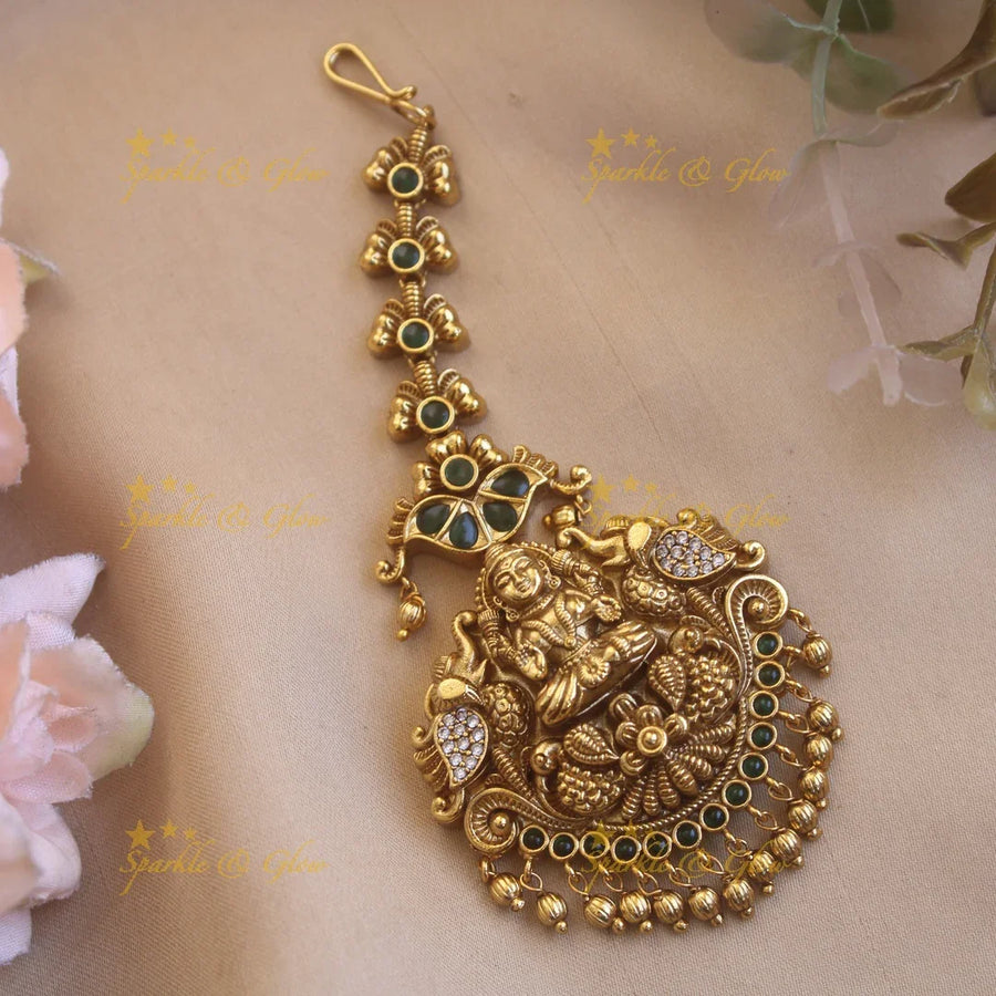 Exclusive gold alike lakshmi with some AD and green stone and gold beads maang tikka - Sparkle and Glow