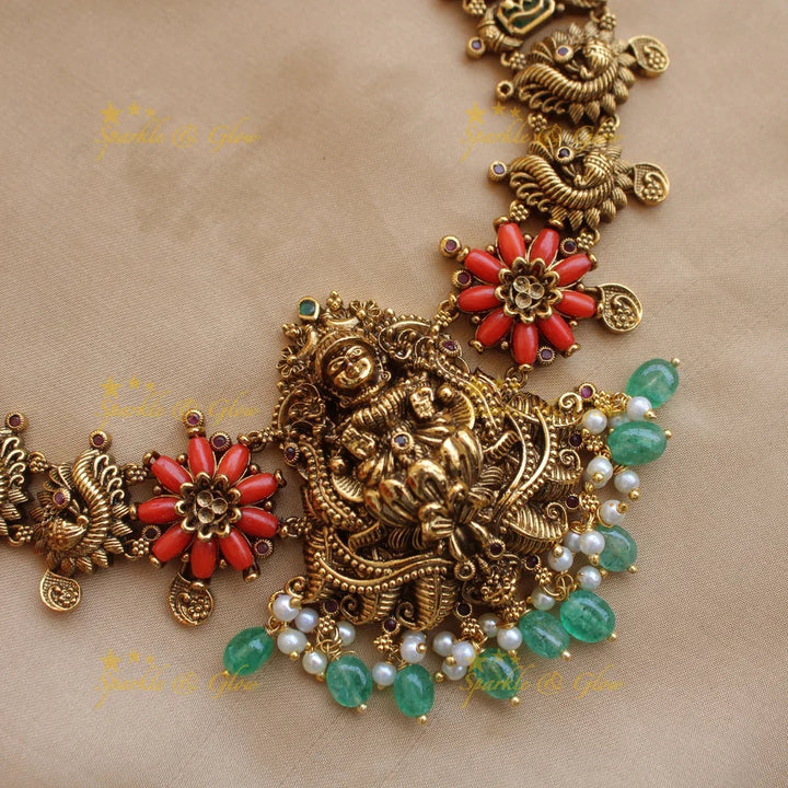 Statement Lakshmi peacock carved short necklace with coral and mint green beads - Sparkle and Glow
