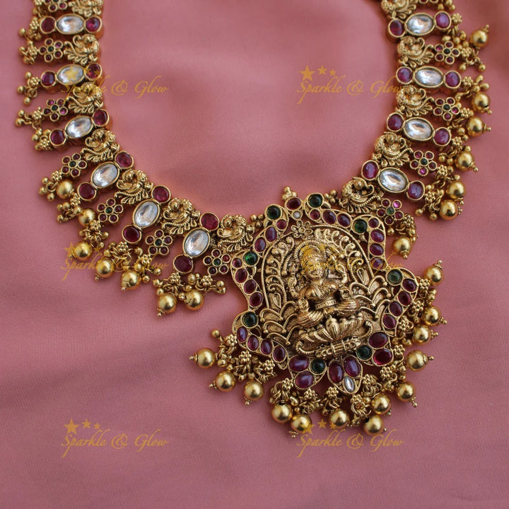 Grand intricate Lakshmi peacock carved kemp stone long necklace with gold beads - Sparkle and Glow