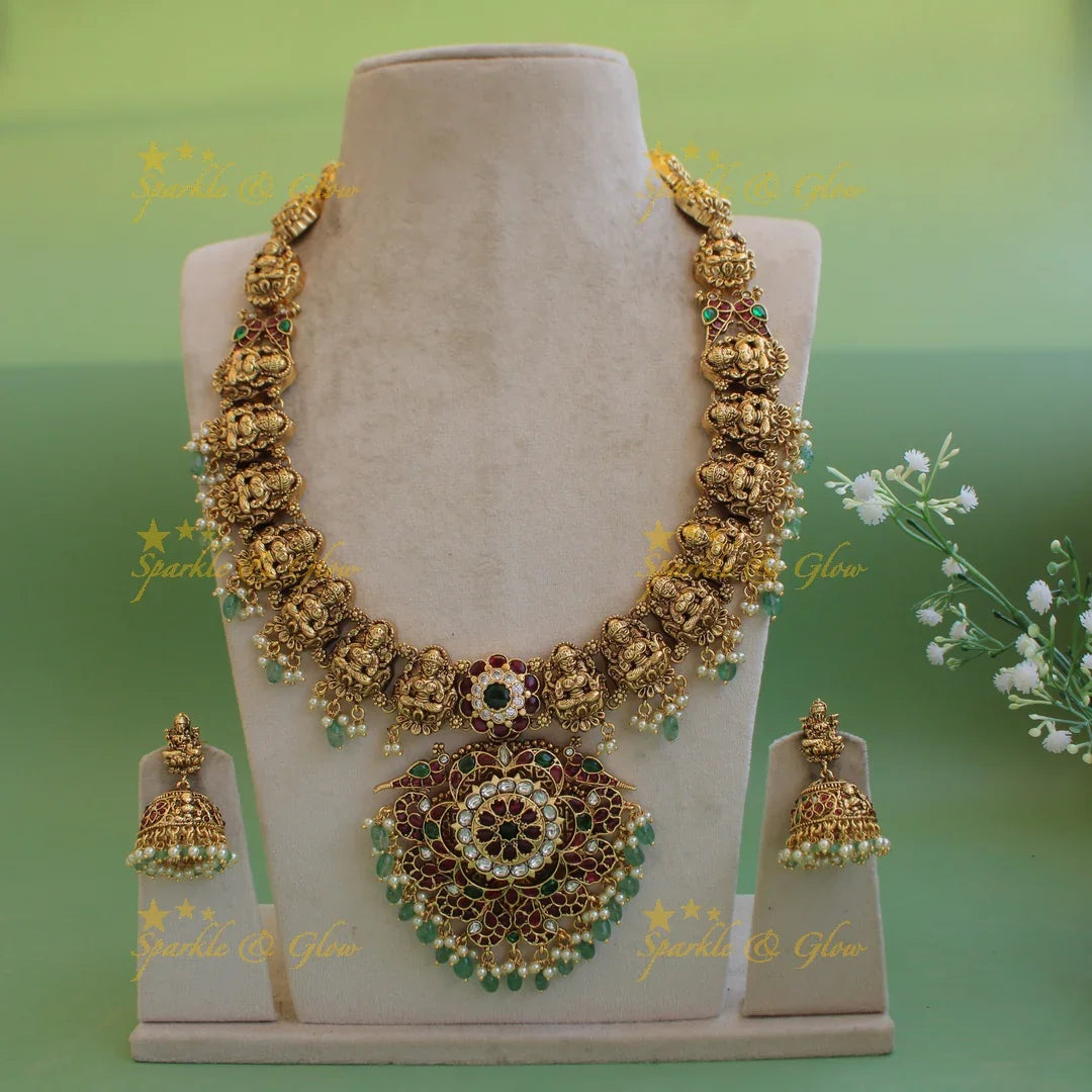 Gorgeous Lakshmi peacock floral kemp stone long necklace with pearls and mint green beads - Sparkle and Glow