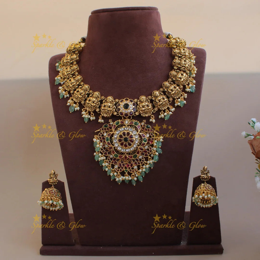 Gorgeous Lakshmi peacock floral kemp stone short necklace with pearls and mint green beads - Sparkle and Glow