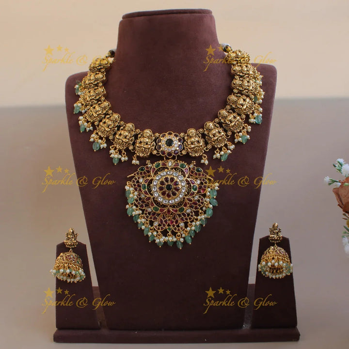 Gorgeous Lakshmi peacock floral kemp stone short necklace with pearls and mint green beads - Sparkle and Glow