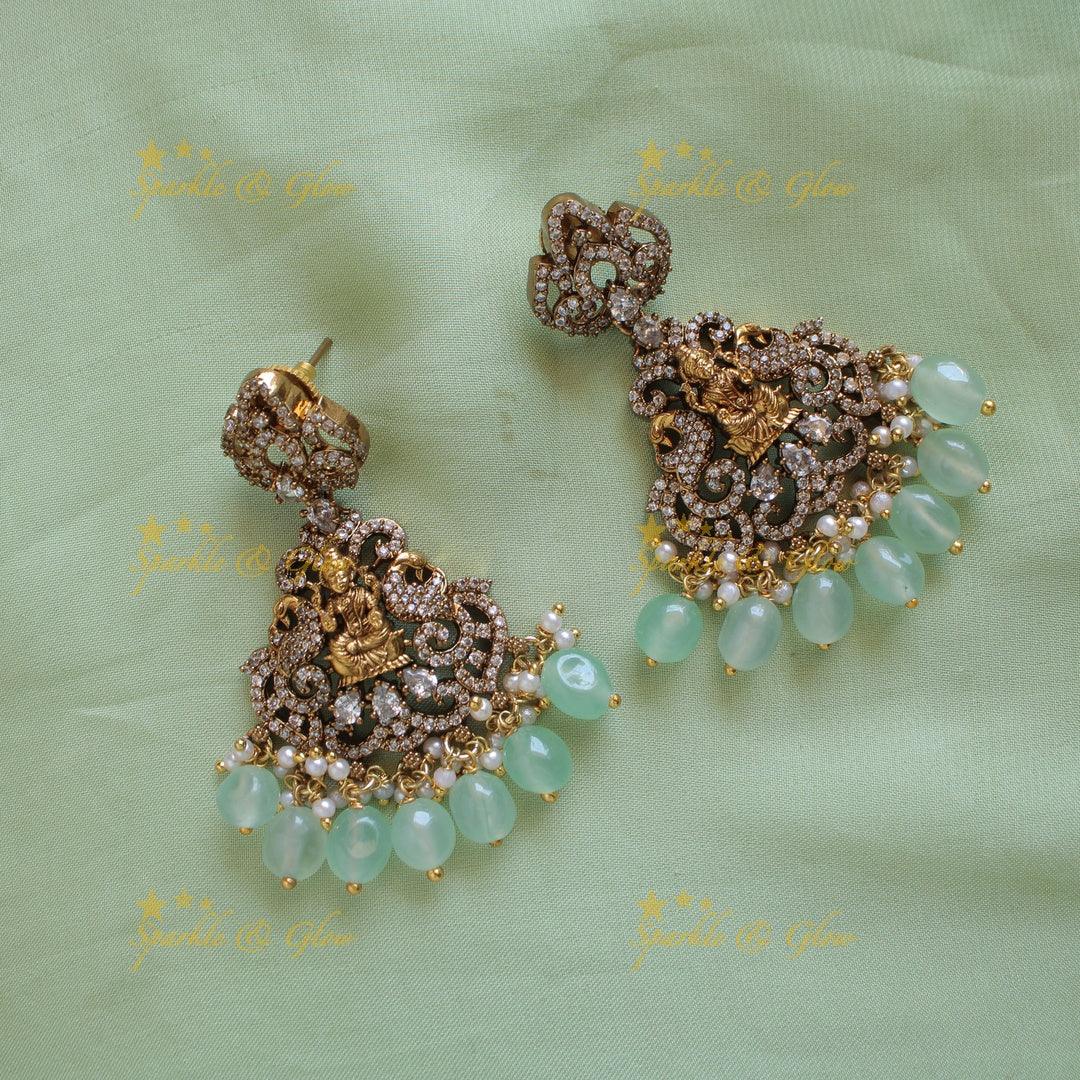 Elegant Lakshmi elephant peacock design dual tone victorian AD short necklace withmint green beads - Sparkle and Glow