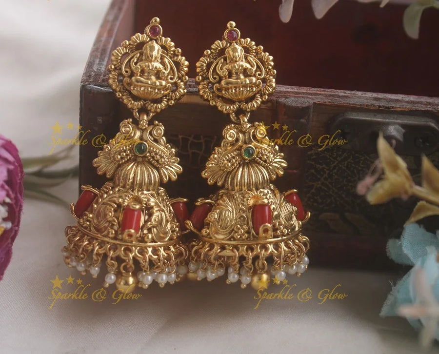 Idol Lakshmi Peacock Carved Jhumukas with Coral Beads - Sparkle and Glow